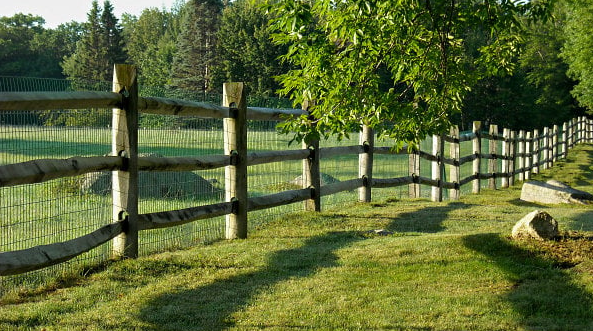 wood fence with wire mesh